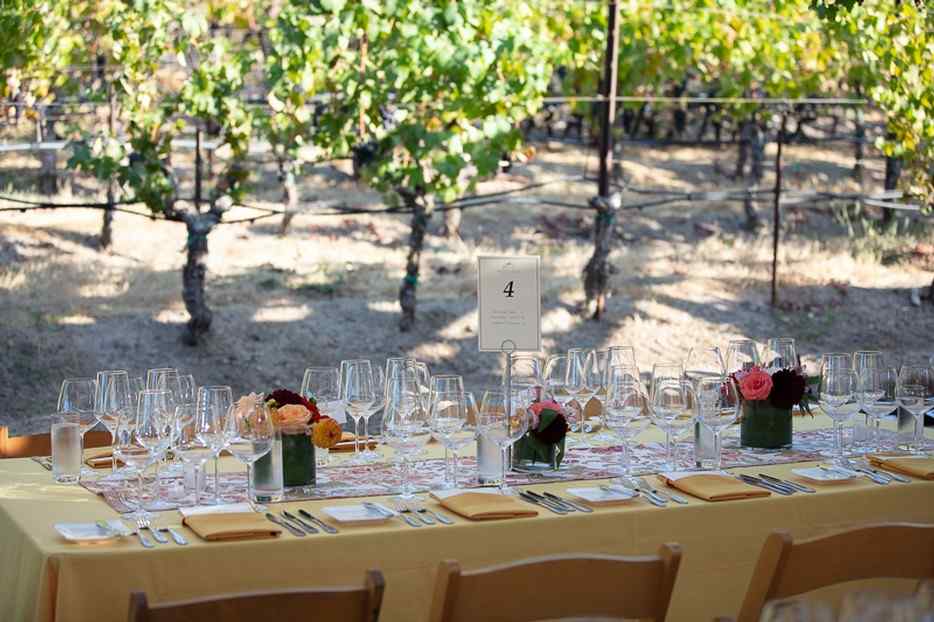 Martinelli Harvest Table dinner with multiple wineglass setup